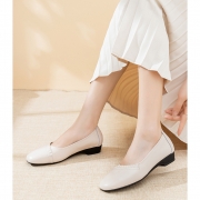 Off white shallow cut flat sloping heels