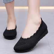 Black shallow cut lace flats